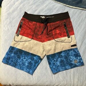 Pelagic Men’s Red, Cream, and Blue Board Shorts